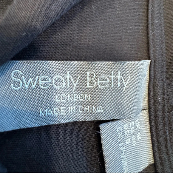 Sweaty Betty Tori Hooded Top Women's Size M Black  Twist Front Stretch - Picture 4 of 9